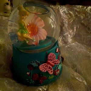 It’s from Disney it’s had tinker bell inside it’s from Disney store in NYC